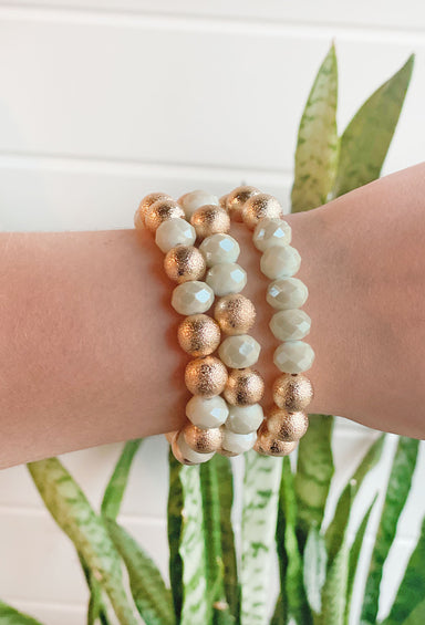 Layla Bracelet Set in Ivory, Three beaded bracelets featuring black and gold textured beads