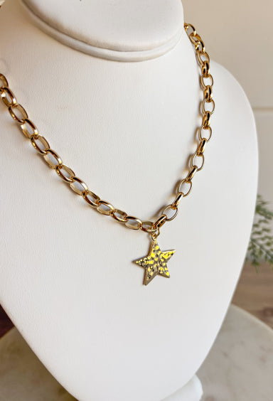 Simple and chic, this gold chain necklace is finished with a hammered star charm for just the right touch of texture. Measuring 16" in length, it’s the perfect everyday piece to wear solo or layered with other necklaces. Lightweight and versatile, it adds a hint of shine that works year-round.