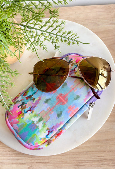 The Brooks Avenue Laura Park Neoprene Sunglass Case, sunglasses pouch with zipper in the "Brooks Avenue" Pattern in the colors lilac, bubblegum pink, lime green, turquoise, blue, orange, sage and off white