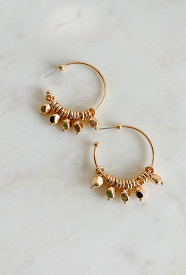 City Escape Earrings in Gold, gold hoop with ring and bead detailing that move around the hoop