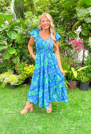 Floral Embrace Midi Dress, blue and green floral dress with cinching at the waist, tiering, and ruffle sleeve details