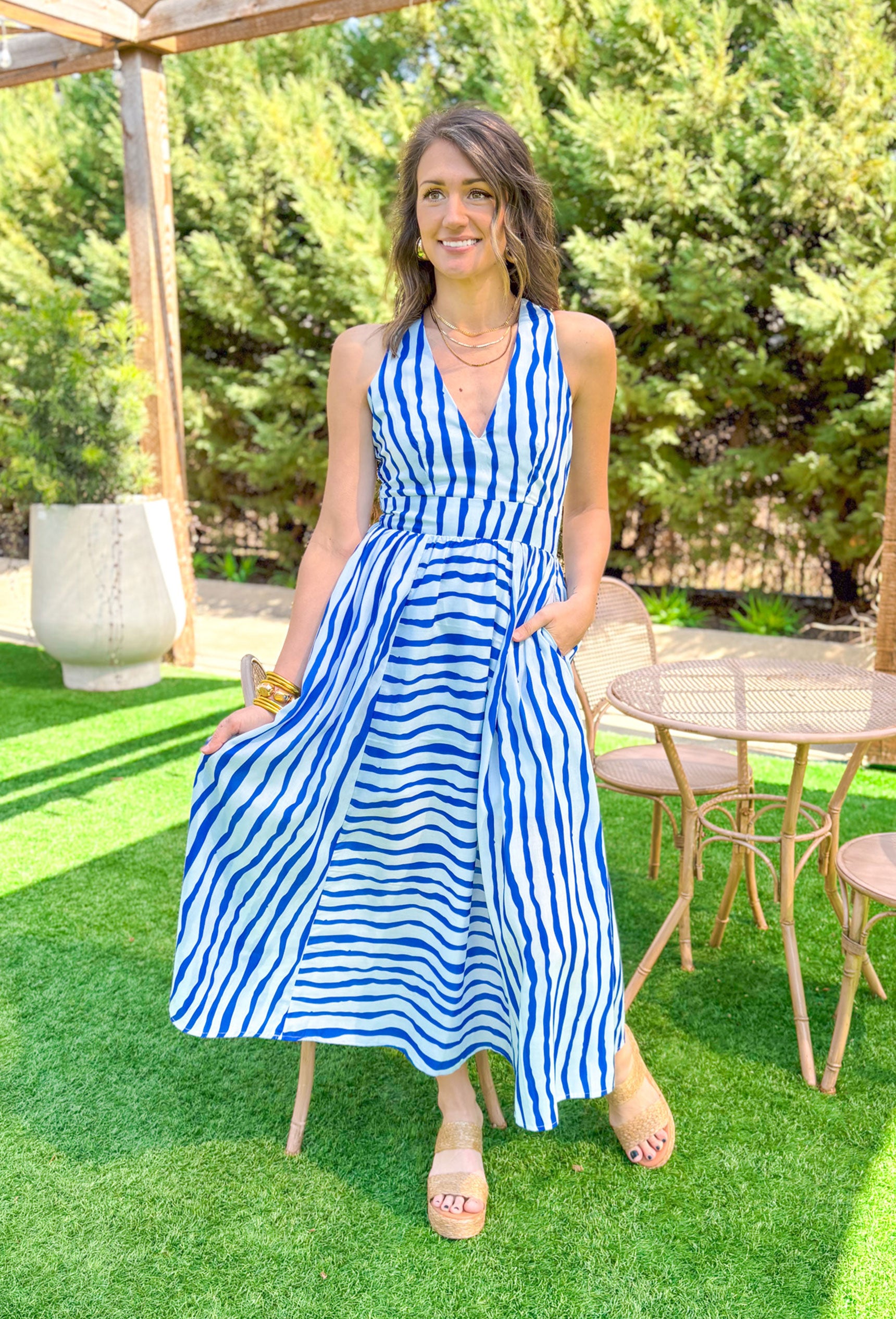 Island In The Sun Midi Dress, light blue and royal blue vertical and horizontal striped sleeveless dress with deep v-neck and pockets