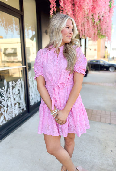 Making Me Blush Dress, bubblegum pink lace puff sleeve dress with quarter button down detail and tie detail around the waist