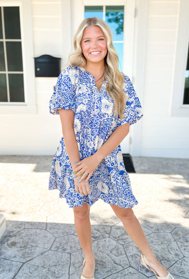 Meet Me In Santorini Dress, blue and off white paisley floral puff sleeve dress with v-neck