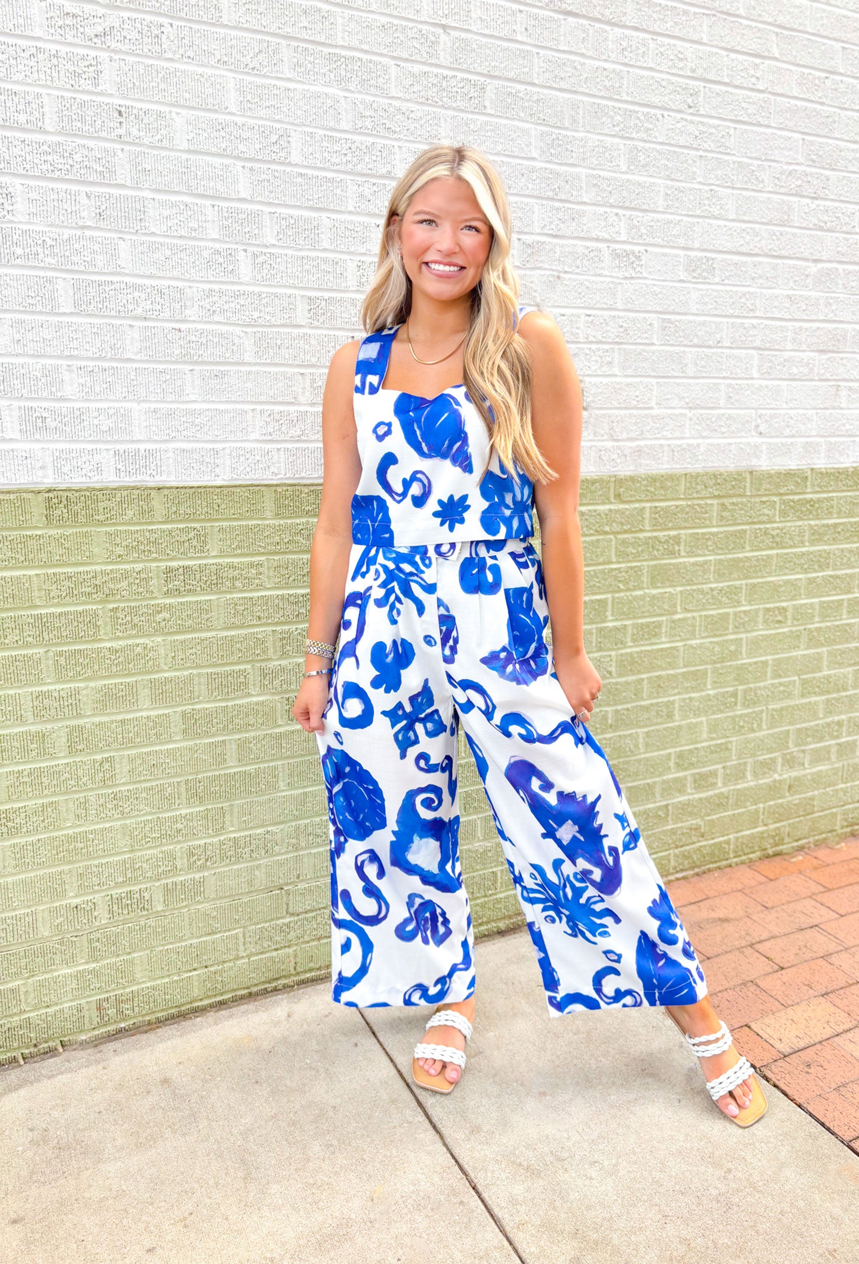 My Better Half Set, blue and white tank top and wide leg pant set with shell pattern on the top and bottom. Tank top is a square neck line and pants have slack like button feature with pockets
