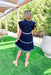 Off The Coast Dress, ruffle sleeve v-neck ric-rac dress in navy with white, turquoise and cobalt ric rac on the neck, down the chest, and on each tier of the dress 