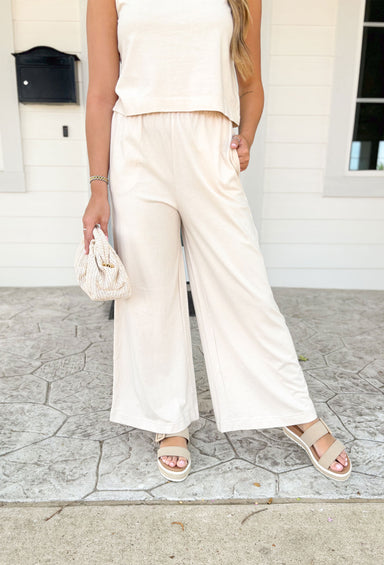 Z SUPPLY Scout Jersey Flare Pant in Sandshell, sand colored wide leg pant with elastic waist band and pockets