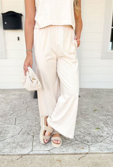 Z SUPPLY Scout Jersey Flare Pant in Sandshell, sand colored wide leg pant with elastic waist band and pockets