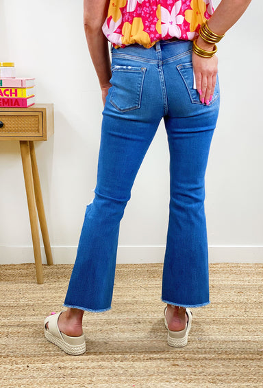 Bella High-Rise Flare in Medium Wash, medium wash flare jeans, hole at the knee