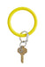 O-Venture Silicone Key Ring in Yes Yellow, yellow circular key ring that can be worn around your wrist 