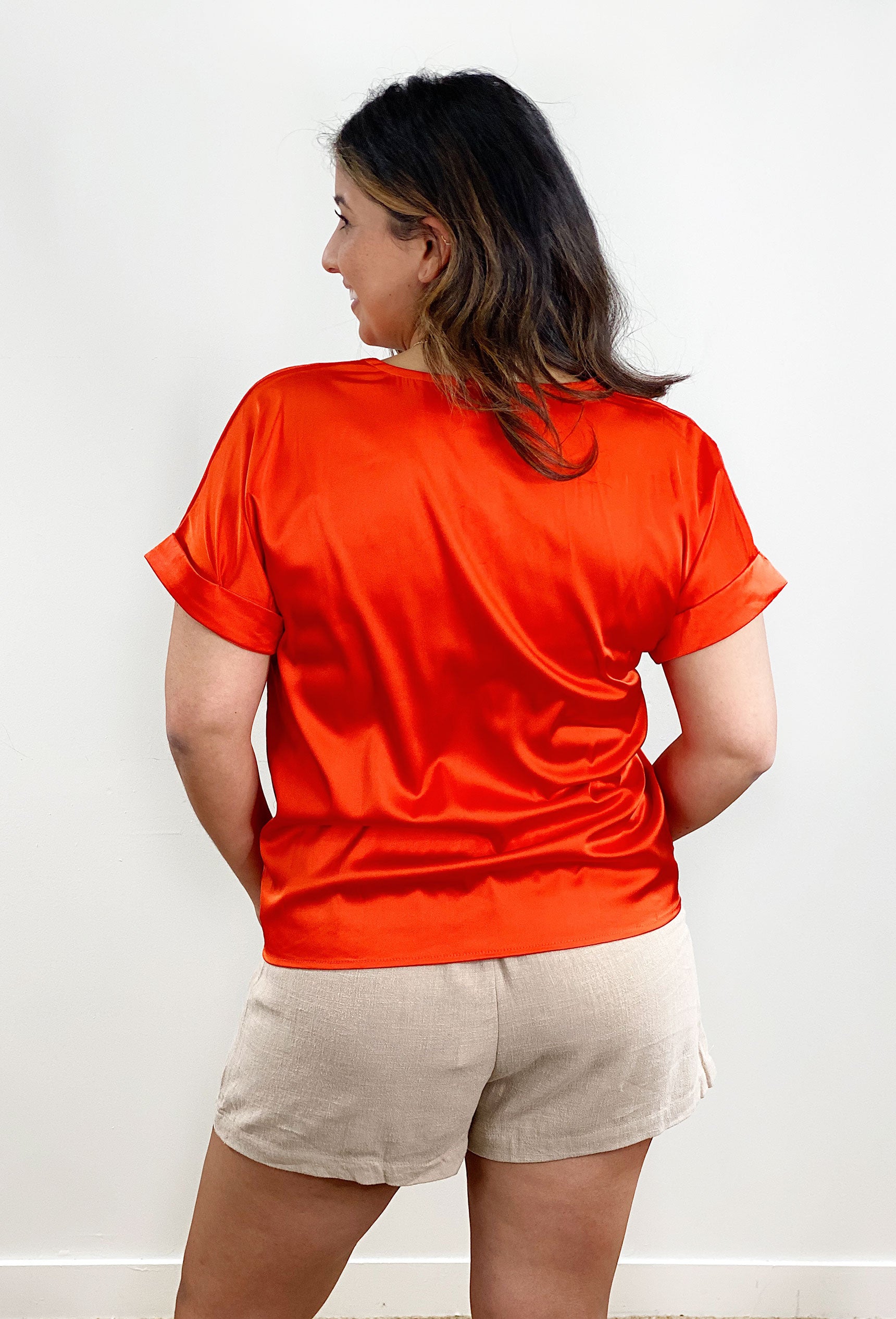 Alexandra Blouse in Tomato Orange, orange short sleeve blouse, cuffed sleeve, v-neck\