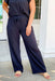 Allison Gauze Pants in black. Cozy and lightweight wide leg pants featuring an elastic waistband.