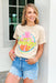 Neon Beach Boys Graphic Tee,  Neutral tee with a bold and bright neon design that reads "The Beach Boys" and a classic palm tree motif