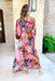 Bold Beauty Maxi Dress, Abstract leopard maxi dress with deep v- neck line and flowy quarter length sleeves. Colors are black, light blue, army green, light magenta, coral, brown and cream 