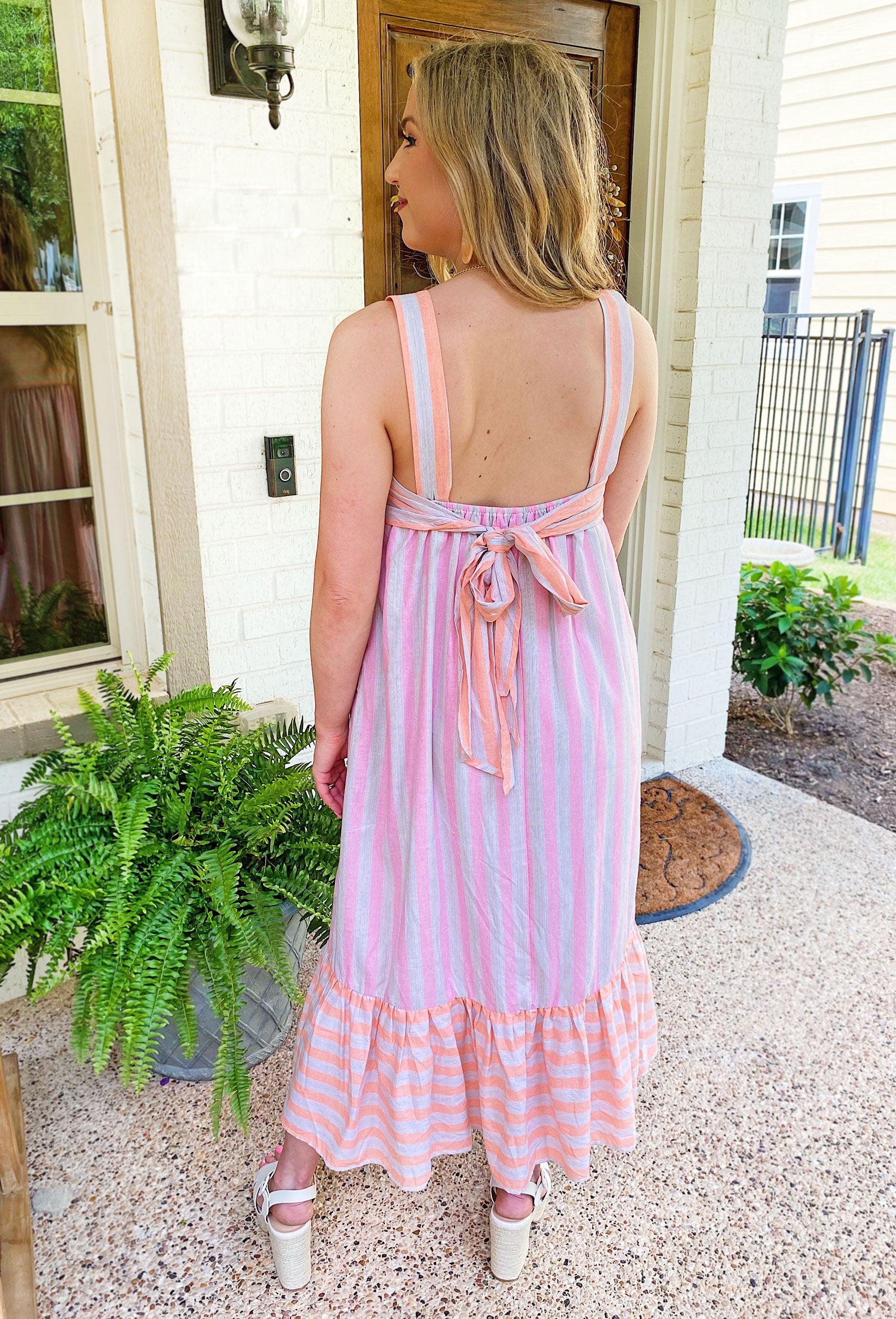 Destination Dreamy Maxi Dress, Midi dress featuring neutral and bright stripes, detailed bow tie in the back