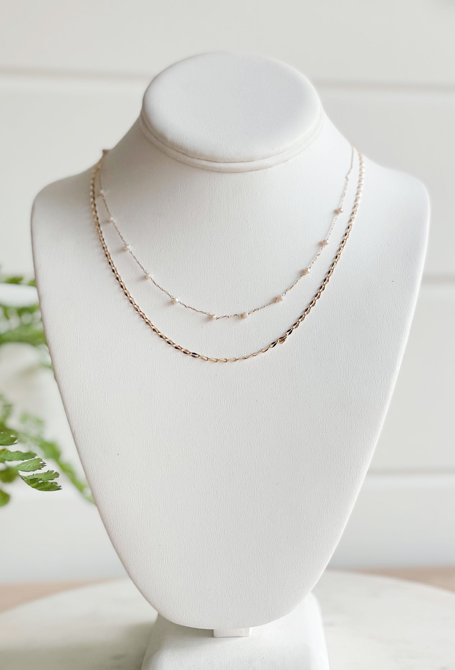 Falling For You Necklace, single dainty gold chain necklace with white beaded detail and a lobster clasp