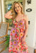 Forever Mine Floral Maxi Dress, Maxi dress featuring a vibrant colorful floral print, a front twist detail, and an open back with a tie closure