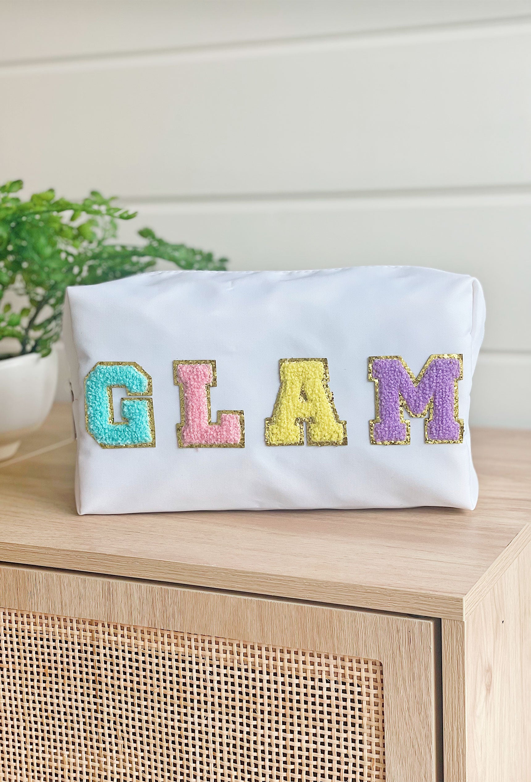 Glam Cosmetic Bag in White, White nylon cosmetic bag with "glam" printed in a colorful textured font