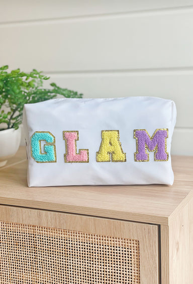 Glam Cosmetic Bag in White, White nylon cosmetic bag with "glam" printed in a colorful textured font