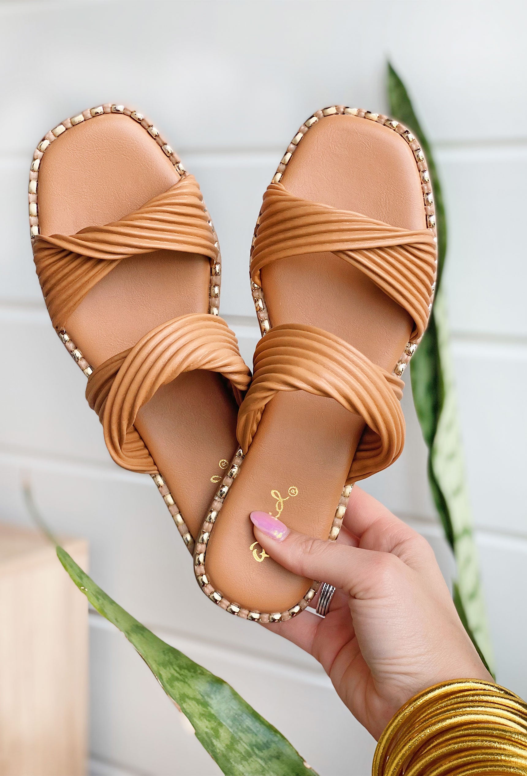 Indigo Camel Sandals. Sandals with double camel bands and gold detailing around the edge.
