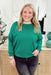 Lilly Sweater by Dreamers in Heathered Green, mid length sweater with ribbing on the hem and wrists 
