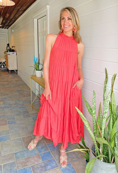 Lisbeth Coral Tiered Maxi Dress, coral colored maxi dress, tiered body, ruffle neckline with self tie detailing in the back