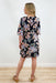 Midnight Garden Floral Dress, Black mini dress featuring a vibrant floral print and a V neckline