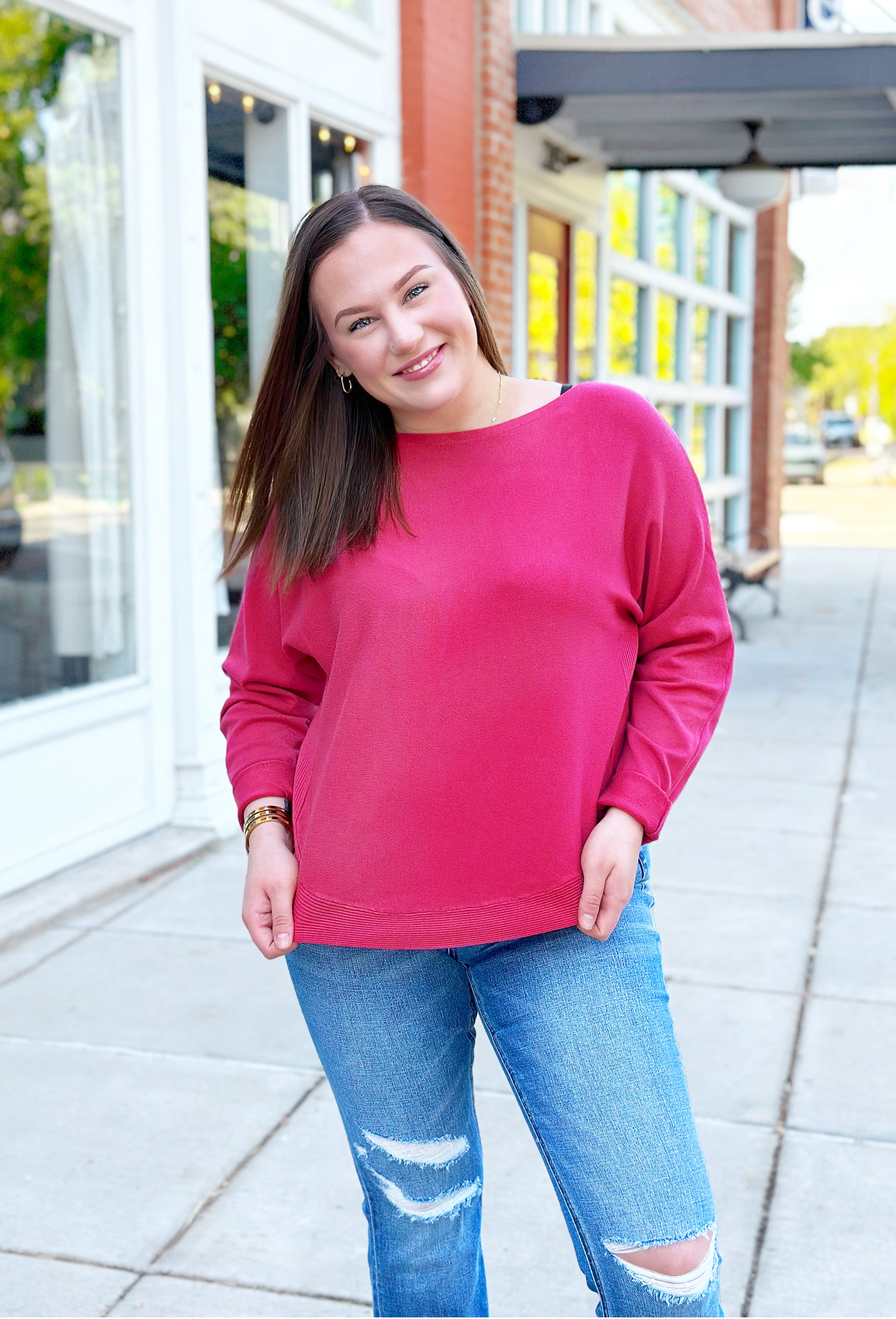 Sara Sweater by Dreamers in Rouge, sweater with crescent hem with ribbing on the hem and wrists 