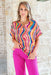 Sunshine On A Cloudy Day Blouse, Colorful abstract top with a V neckline 