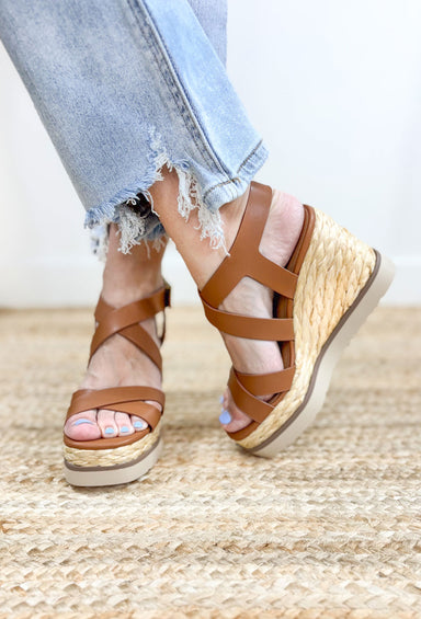 Calina Espadrille Wedges, raffia heel with cognac strap detailing across the toes, top of the foot, and around the ankle