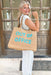 Out of Office Tote, neutral woven raffia that reads "Out Of Office" in a beautiful blue raffia