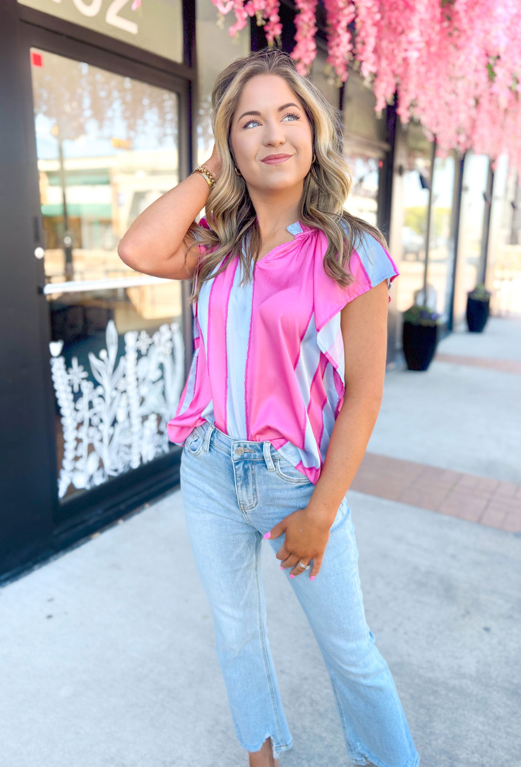 Better Off Blouse in Pink, hot pink and light blue abstract striped short sleeve blouse with v-neck