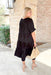 Caught Feelings Midi Dress in Black, black shorts sleeve tiered dress with small v-neck