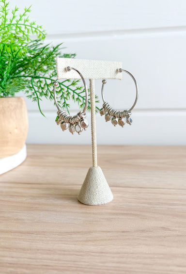 City Escape Earrings in Silver, silver hoop with ring and bead detailing that move around the hoop