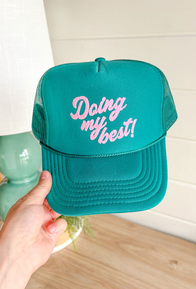 Doing My Best Trucker Hat, turquoise otto trucker hat with puff vinyl "doing my best" in a light pink
