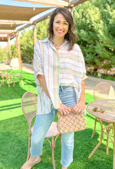 First Things First Top in White, white dulman sleeve blouse with sage, terracotta, grey, lime and peach stripes going horizontal on one side and vertical on the other side