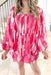Hampton Hideout Romper, hot pink, pink and white long sleeve romper with cinching across the chest, square neck line, and cinching at on the wrist