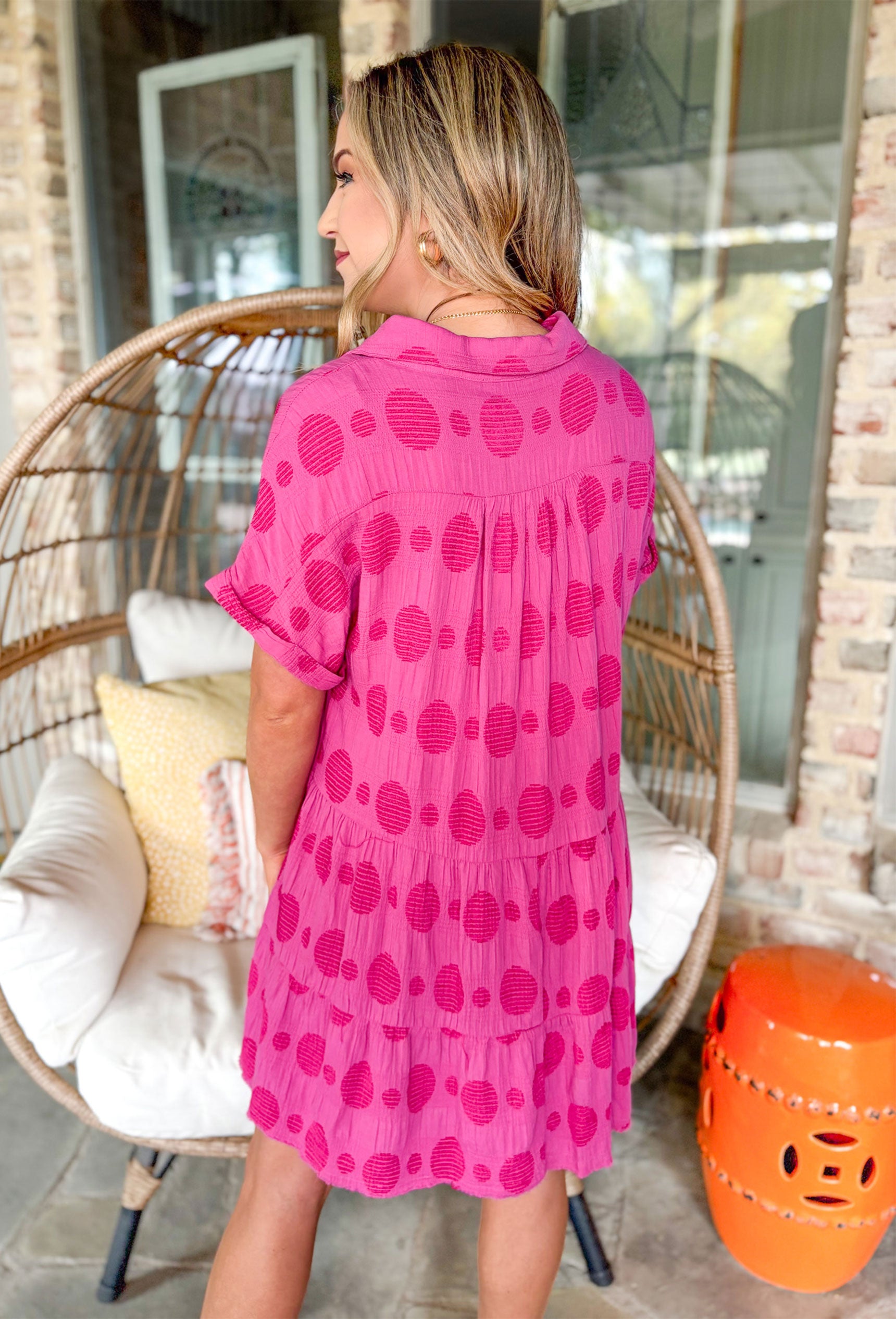 Living In The Moment Dress, short sleeve v-neck tiered dress in hot pink with mesh circle peek-a-boo details across the whole dress