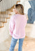 Lover Graphic Sweatshirt, light pink crewneck with pink text saying "lover" with graphic bow 