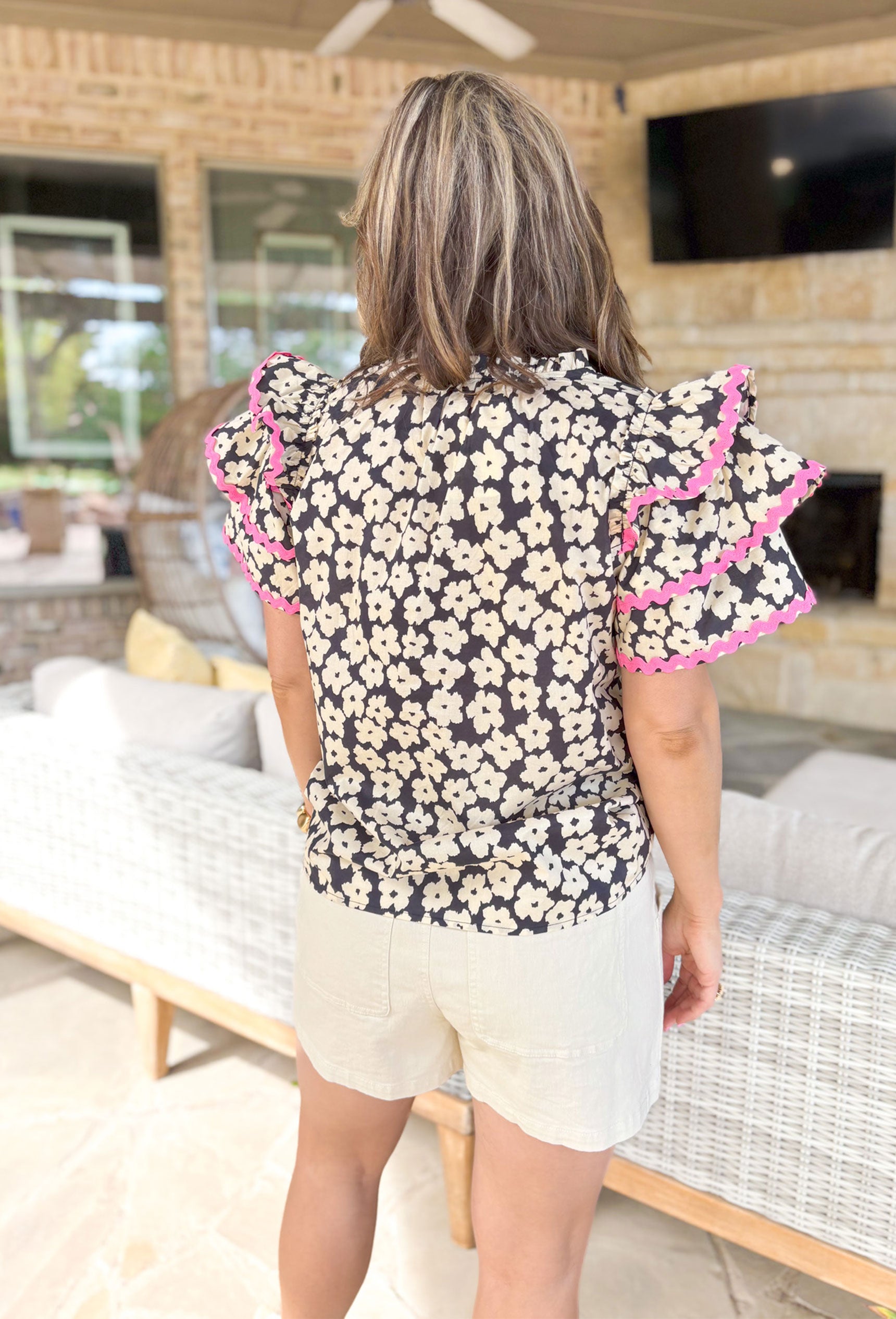 Natural Beauty Floral Blouse, black and cream floral blouse with pink rik-rak details on the ruffle sleeves