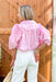 No Doubt Top in Pink, short puff sleeve button down top with pleating across the chest and ruffle details on top of the shoulders