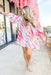 No Looking Back Dress, zebra print long sleeve button up dress in hot pink, light pink, bubblegum pink, turquoise, orange, white, and yellow