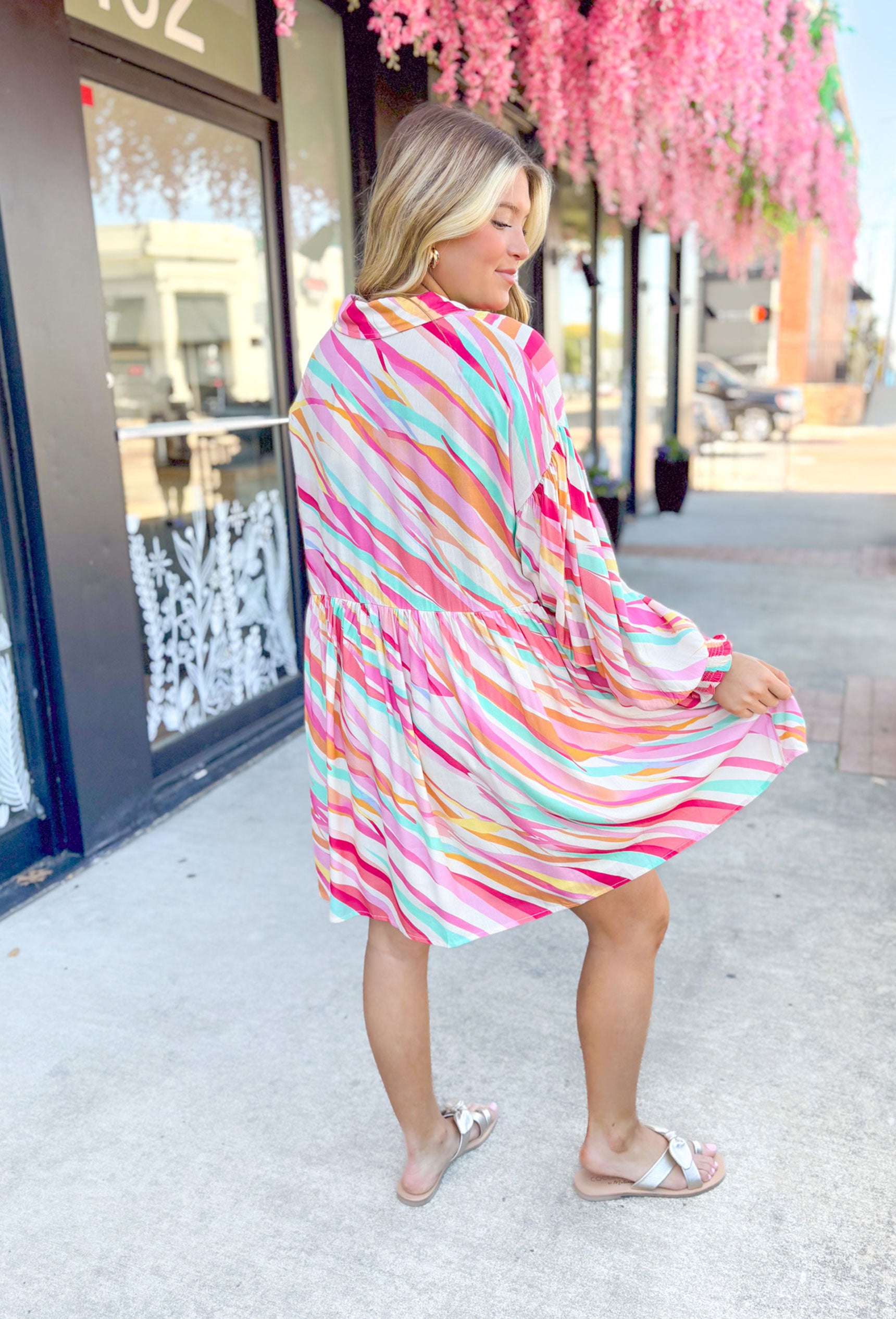 No Looking Back Dress, zebra print long sleeve button up dress in hot pink, light pink, bubblegum pink, turquoise, orange, white, and yellow