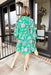 Paris Dreaming Floral Dress, green and pink long sleeve dress with collar, cinching on the wrists, and quarter button down 