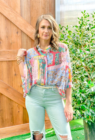 Ready For A Change Top, quarter length sleeve button up blouse with collar and abstract pattern in the colors light pink, light blue, coral, mustard, green, and pink