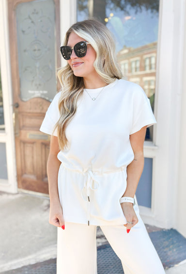 Reasons To Stay Top, cream short sleeve top with drawstring at the waist line 