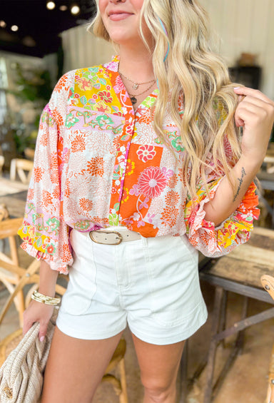 Spring Dream Floral Blouse, blouse quarter length sleeve button down with floral print in the colors orange, cream, yellow, green, and hot pink