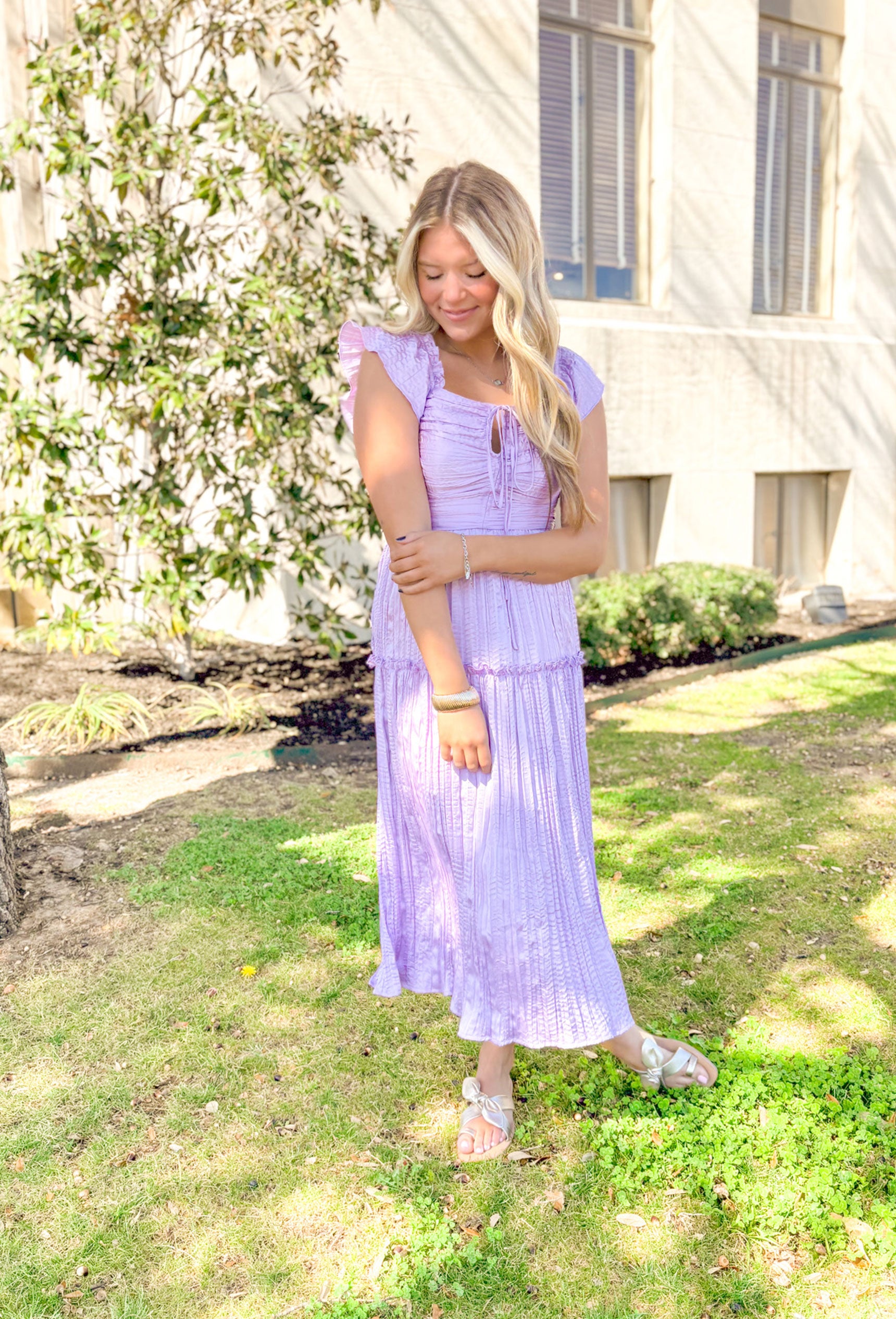 Venice Vision Midi Dress, lilac midi dress with ruffle sleeve detailing, drawstring on the chest and pleating all down the dress