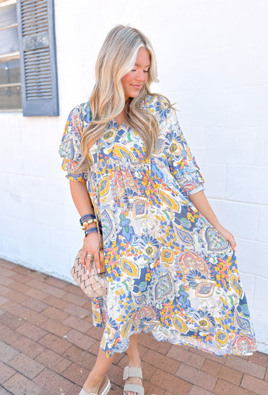 With You Always Midi Dress in Blue, paisley flower short sleeve midi dress, slight v-neck, in the colors light blue, blue, yellow, cream, white, orange, coral, tan, and sage