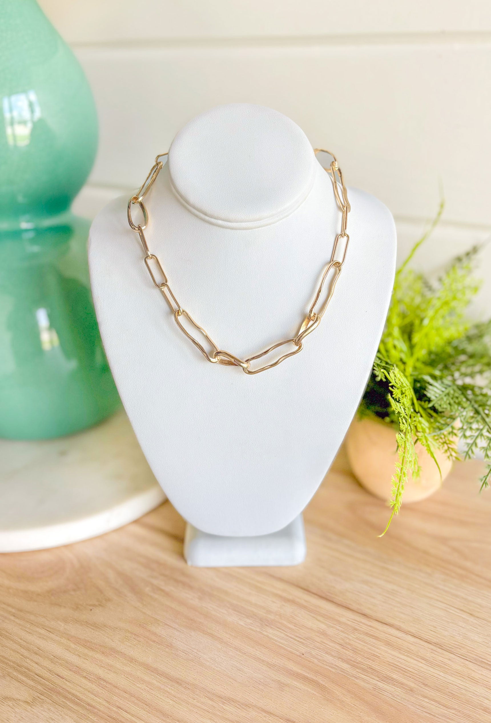 Can't Stop You Necklace, a mix of wavy and regular gold paper clip chain links with lobster claw